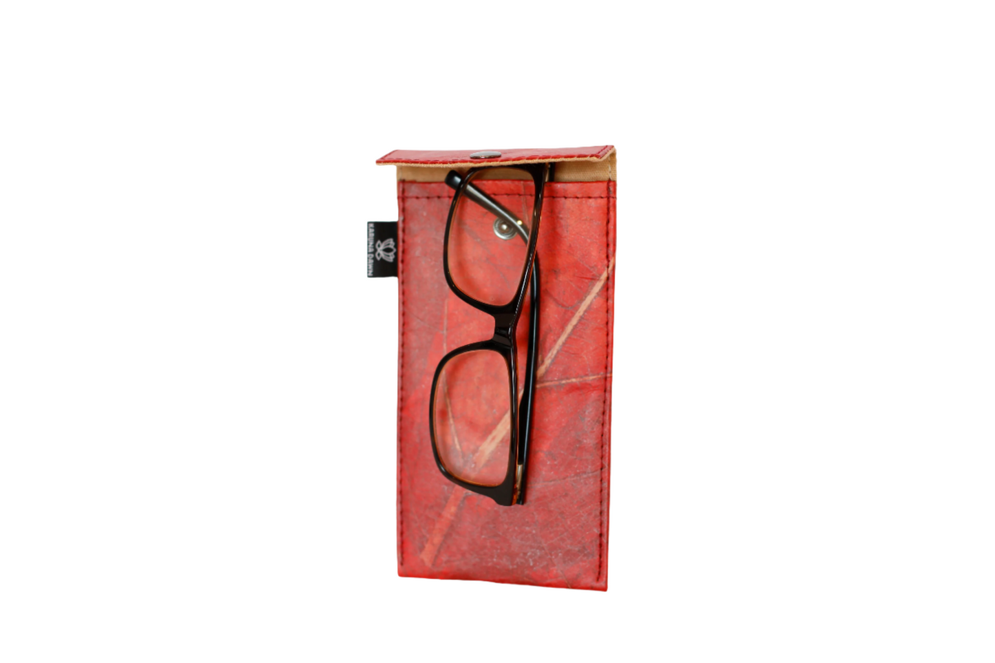 Red eyeglass case with a pair of black-framed glasses on a white background