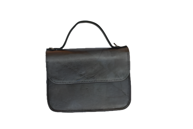 Blue vegan leather handbag on a white background