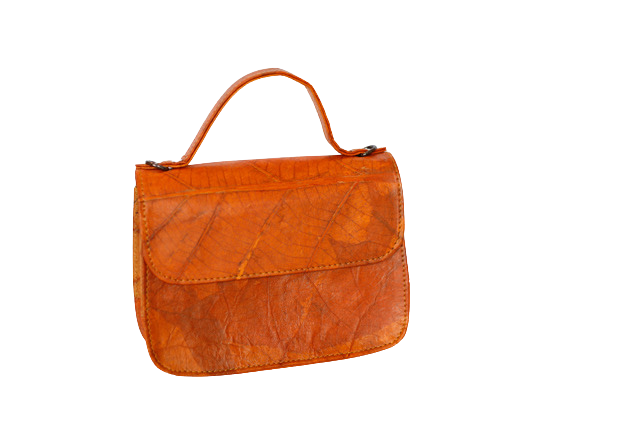 Orange vegan handbag on a white background